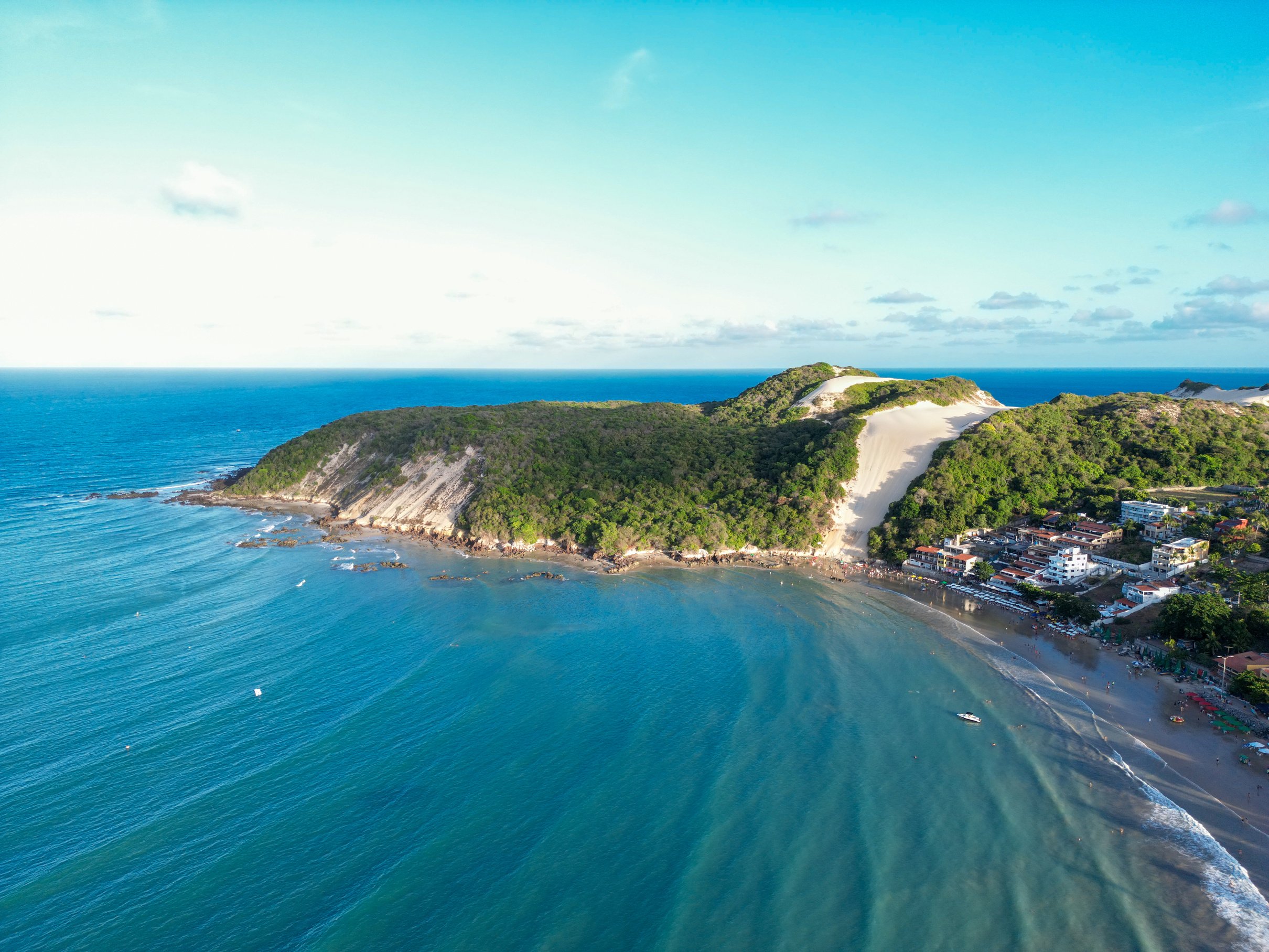 Photo area view of Ponta Negra beach and Morro do Careca in the city of Natal, Rio Grande do Norte, Brazil